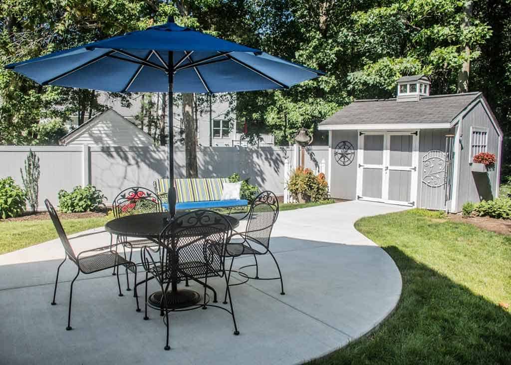 Concrete patio with patio furniture in Grand Rapids